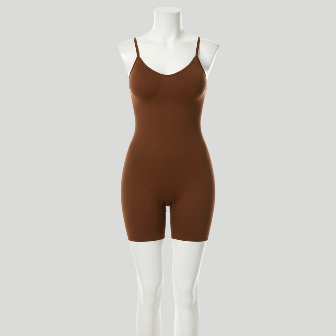 Black bodysuit on a white mannequin against a white background