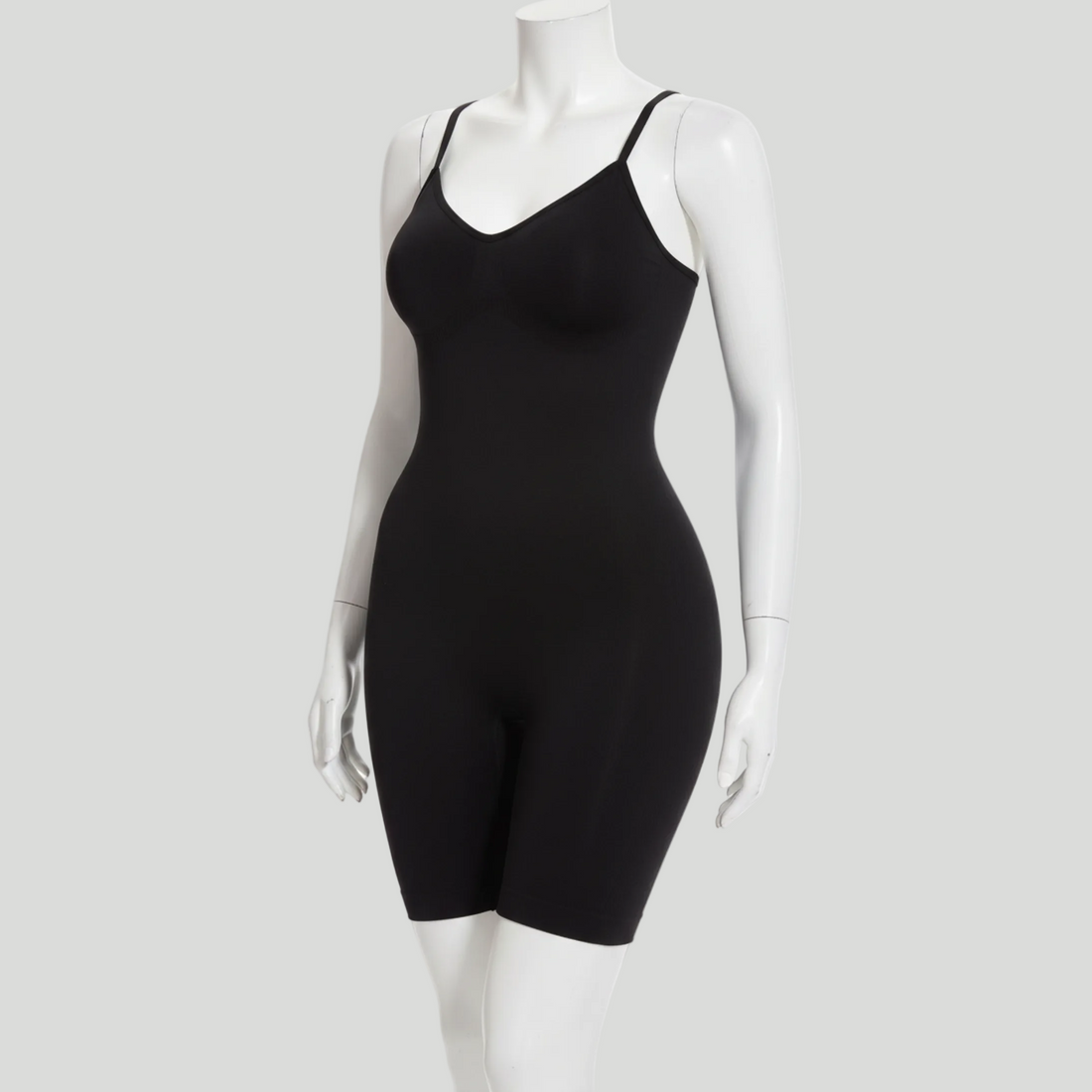 Black bodysuit on a white mannequin against a white background